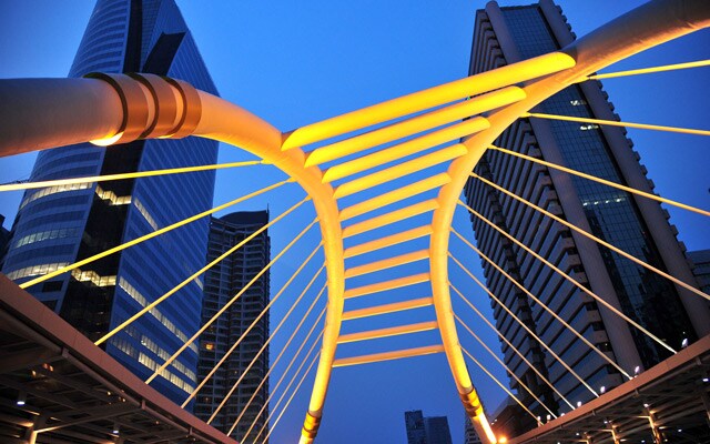 Structure in a business area with buildings in the background