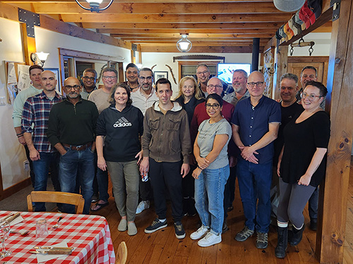 Picture of the SEB Team gathered in a cottage during the SEB Retreat